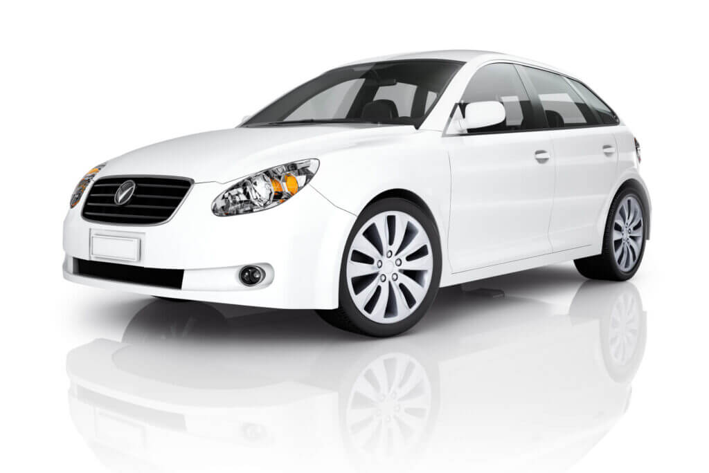 A white, modern hatchback car is showcased against a plain background, highlighting its sleek lines and stylish design.